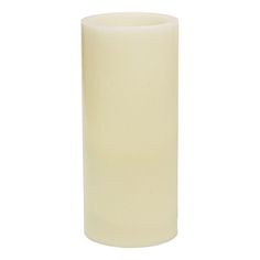 a white candle is on a white background