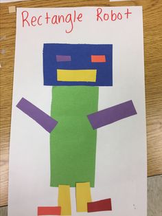 a paper cut out of a robot with the words rectangle robot written on it