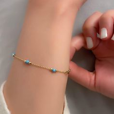 "◖ P R O P E R T I E S ◗ 14k Gold & Turquoise Beaded Dainty Bracelet, Aqua Blue Layering Bracelet, December Birthstone, Fine Jewelry, Graduation Gift * Material: 14k Yellow Gold, 14k Rose Gold, 14k White Gold * Chain Width: 0,04\" // 1mm (±10%) * Size: 6\" - 8\" // 15,2cm - 20,3cm (Please contact me for different sizes) * Adjustable: 0,5\" extension will be added to selected length. Note: Beads count may be differ due to selected length. ◖ D I O N J E W E L ◗ ‣ 14K REAL GOLD ‣ EXPRESS DELIVERY I Turquoise Bracelets For Gift, Dainty Blue Gemstone Beaded Bracelets, Blue Dainty Gemstone Beaded Bracelet, Blue Hand-strung Jewelry, Dainty Blue Gemstone Bracelets, Dainty Blue Gemstone Bracelet, Gold Heart Bracelet, Jewellery Marketing, Dainty Bracelet