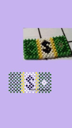 the beaded bracelet has been made with beads and is green, yellow and white