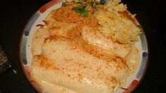 a plate filled with food on top of a table