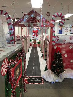 an office decorated for christmas with candy canes