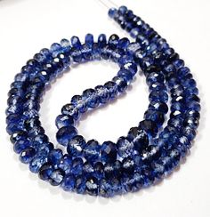 "AAAA+ Quality-Blue Sapphire Faceted Rondelle Beads Genuine Sapphire Gemstone Beads Large Rondelle Beads Full Sparkling Blue Sapphire Jewelry Item Code :   7148 Origin-:   Blue Sapphire Srilanka Grade-:  AAA Luster Sapphire  Stone shape-: Faceted Rondelle Beads Stone color-: Same As Picture  Metal           -: 925 Silver Clasp NOTE FOR BUYER:  I Will Make This Beautiful Necklace With Sterling Silver Clasp Length        -: 18 Inch Quantity-: 1 Strand Necklac Approx Weight   :  243.50 Carat   Approx Size        :   5 To 10 MM MOST BEAUTIFUL SAPPHIRE STRAND FOR JEWELRY MAKING AND GIFT FOR ANYONE. If you have any questions about this item please contact me I will get back to you as soon as ABOUT US skgemsstone based in Jaipur, India is a company engaged in supplier, manufacturing, wholesale an Blue Crystal Round Beads, Blue Beaded Necklaces With Stones For Jewelry Making, Blue Oval Gemstone Beads, Blue Rondelle Faceted Bead Necklace, Blue Rondelle Beaded Necklace With Faceted Beads, Blue Rondelle Faceted Bead Necklaces, Blue Faceted Oval Beads, Sapphire Beaded Necklaces With Faceted Round Beads, Blue Rondelle Beaded Necklace With Spacer Beads