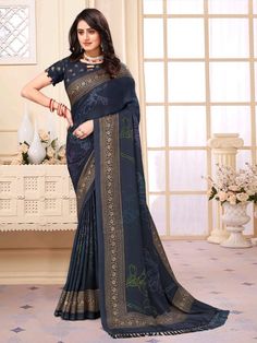 Mihira Georgette Printed Saree Soft easy to wear georgette fabric. Comes with unstitch blouse fabric. The Mihira Saree is a sophisticated piece that combines traditional Indian style with modern design. Made from high quality Georgette fabric, this saree features a stunning print that adds a touch of elegance. Blue Bandhani Print Traditional Wear In Georgette, Blue Georgette Traditional Wear With Bandhani Print, Eid Georgette Blouse Piece With Printed Border, Elegant Traditional Wear With Bandhani Print, Blue Bandhani Print Georgette Saree, Blue Georgette Saree With Bandhani Print, Elegant Bandhani Print Georgette Dupatta, Traditional Unstitched Chiffon Blouse, Unstitched Georgette Blouse With Bandhani Print