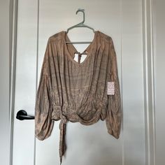 Super Cute Boho Free People Top. The Back Is Partially Open With A Tie At The Neck And Another Around The Waste. Brand New With Tags! Beige Long Sleeve Tops With Boho Print, Beige Boho Print Long Sleeve Tops, Boho Print V-neck Top For Day Out, Casual Beige Tops With Boho Print, Casual Beige Boho Print Top, Boho Free People, Crochet Bell Sleeve, Ruffle T Shirt, Free People Long Sleeve