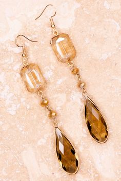 Elegant Gold Faceted Crystal Earrings, Gold Faceted Earrings For Evening, Elegant Faceted Chandelier Earrings, Elegant Rectangular Crystal Earrings, Gold Faceted Crystal Earrings For Party, Gold Faceted Drop Earrings, Gold Earrings With Rectangular Stone For Formal Occasions, Gold Rectangular Crystal Earrings For Party, Elegant Gold Earrings With Rectangular Stone