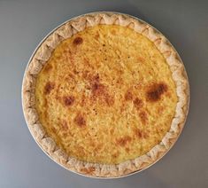 an uncooked pie sitting on top of a table