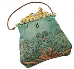 I imagine something like this when I picture Ruby's favorite handbag: beaded, short strap (they didn't have shoulder straps in the 20s), closing with a metal clasp.  The Egyptian theme was very popular in the 1920s following the discovery of King Tut's tomb!  Egyptian Odalisque Evening Bag, 1927 (Van Cleef & Arpel, Paris) Art Deco Bag, Bijoux Art Deco, Moda Hippie, Vintage Evening Bags, Kelly Bag, Egyptian Revival, Bag Designs, Vintage Purses, Chatelaine