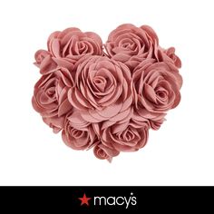 a heart made out of pink roses on a white background with the words macy's written below it