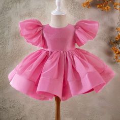 Baby Girl dress Special Occasion Item material: non- stretch fit: regular  Care instructions: professional dry clean Fitted Solid Princess Dress With Ruffles, Solid Color Fitted Princess Dress, Short Sleeve Princess Dress For Party, Solid Color Short Sleeve Princess Dress For Party, Princess Dress With Short Sleeves For Party, Pink Short Sleeve Tutu Dress With Ruffles, Pink Puff Sleeve Princess Dress For Dress-up, Solid Color Ruffled Dress For Baptism, Fitted Pink Twirl Dress For Playtime