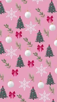 a pink background with white and red christmas ornaments on it's branches, snowflakes, and bows