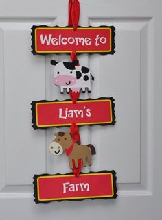 a door hanger with farm animals on it