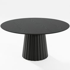 a black round table with pleated edges on an isolated white background for use in interior design