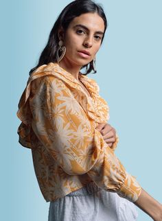 Our yellow tropics printed cotton with a wide collar is seriously the most beautiful shirt. Body is lined. 

  
 * Cotton 
 * Imported 
 * Powered by our patented No Gape® button technology. 
 *   Model is 5'7" and is wearing a size small.   C - TS21SU3012 - SS21 C - TS21SU3012A Tropical Cotton Collared Top, Yellow Floral Print Tropical Tops, Luxury Yellow Printed Tops, Yellow Tropical Printed Top, Beach Tropical Print Button-up Top, Lilac Color, The Shirt, Tropical Print, Printed Cotton