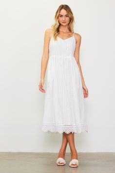 Our dreamy eyelet lace dress has a swoon-worthy silhouette with a sweetheart neckline, nipped-in waist, and scalloped hem. The smocked back and adjustable crisscross straps make for a figure-hugging fit up top. Pack it for your next sun-soaked getaway. •Adjustable straps •Smocked back •Hidden side zipper •Mid-length hem Item Number: 99695 Vacation Dresses Casual, Wedding Guest Dress Trends, Eyelet Lace Dress, Casual Wedding Dress, Lace Midi, Vacation Dresses, Eyelet Lace, Lace Midi Dress, White Midi Dress