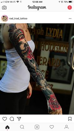 a woman with a dragon tattoo on her arm