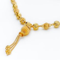 This 22k gold necklace, weighing a substantial 18.4 grams, presents a Royal Orb design, exuding magnificence and splendor. The yellow gold finish enhances its regal appearance. The 16-inch necklace length, along with a 1.5-inch drop and 1.75 inches of adjustable links, ensures a perfect fit and versatility in styling. Secured with a hook lock, this necklace is a symbol of opulence and grandeur, ideal for those who seek to make a majestic statement with their jewelry. PRODUCT DETAILS Gold Purity( 22k Gold Necklace, 16 Inch Necklace, 22k Gold, Necklace Length, Gold Finish, Necklace Lengths, Gold Necklace, Perfect Fit, Yellow Gold