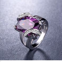 925 Sterling Silver Stamped Radiant Cut Purple Ring Size: 9 It’s Stamped 925 Inside (Shown In The Pictures) Main Stone: Purple Sapphire Secondary Stone: White Sapphire Metal: 925 Sterling Silver Style: Radiant Cut Brand New Never Used Formal Amethyst Open Ring, Elegant Silver Crystal Ring With Accent Stones, Formal Silver Crystal Ring Fine Jewelry, Silver Crystal Ring With Gemstone For Formal Events, Elegant Purple Rings Stamped 925, Silver Amethyst Promise Ring With Diamond Accents, Silver Amethyst Open Ring For Wedding, Formal Silver Amethyst Ring, Silver Amethyst Ring With Diamond Accents For Promise