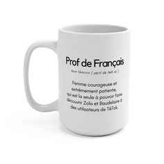 a white coffee mug with the words proff de francais written on it