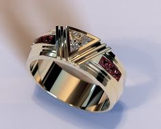 a diamond ring with two different colored stones