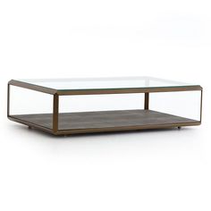 a coffee table with glass top and metal frame on the bottom, against a white background