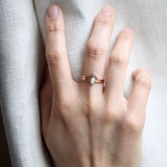 -Simple oval ring stacked with milgrain crown chevron. -14k Solid rose gold fully hallmarked. -Total diamond weight: 0.02ct-Diamond: 1.75mm-Clarity: SI1-Color: G+-Cut: Brilliant -1.4mm band width. -3x5mm Genuine Australian opal-1.75mm round diamond All of our jewelry will arrive in custom packaging ready for gift giving. LEAD TIME:Made to order will take 10-14 days. Dainty Oval Rings With Diamond Accents, Minimalist Oval Diamond Stackable Rings, Oval Stackable Rings With Single Diamond, Delicate Oval Diamond Ring With Single Stone, Delicate Oval Diamond Ring With Single Diamond, Delicate Stackable Oval Rings, Delicate Oval Stackable Rings, Delicate Oval Ring With Single Diamond, Dainty Oval Diamond Ring In 14k Gold