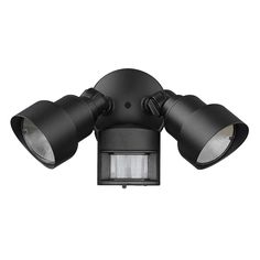 three spotlights on the side of a black wall light with two lights attached to it