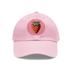 Dive into a world of sweet style with the Strawberry Hat  a delightful fusion of fashion and fruit-themed fun! Crafted from 100% bio-washed chino twill cotton, this hat promises not only a trendy look but also comfort and durability. The hat's material feels soft yet sturdy, making it perfect for everyday wear. What sets this cap apart is its charming 100% PU leather patch, printed with a vibrant strawberry design. The patch adds a unique touch, making the Strawberry Hat a standout accessory tha Strawberry Hat, Pink Patch, Strawberry Design, Mood Lifters, Shape Circle, Cotton Hat, Sweet Style, Laid Back Style, Leather Patches