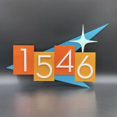 an orange and blue sign with the number fifteen six below it that reads, 156