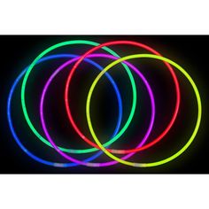 neon glow bracelets in various colors on a black background