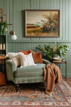 a living room filled with furniture and decor on top of a carpeted floor next to a painting