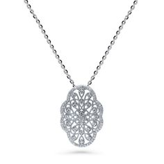 This flower art deco filigree pendant necklace makes the ultimate statement through its vintage-inspired luxe patterns in glimmering blossoms.  Crafted with sterling silver, rhodium plated, stamped 925, nickel free. Set with premium quality 0.71 carat total round cubic zirconia in micro pave and prong setting. Chain measures 18" in length. Pendant measures 1.1" (L), 0.74" (W). Spring ring clasp. Art Deco Pendant Necklace, Art Deco Filigree, Filigree Pendant Necklace, Vintage Style Necklace, Vintage Inspired Art, Filigree Necklaces, Wedding Pendant, Art Deco Pendant, Filigree Pendant