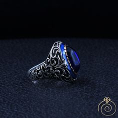 Men's sapphire quartz stone handmade ring which will give you a head turning presence. This mystic, vintage style, engraved ring has a unique design for the polished, refined, and distinguished man. Perfect for casual and formal events, it will make your friends envious as you walk into the room full of confidence and pride. Looking for a unique, one of a kind GIFT FOR HIM, groomsman gift, father's day gift, teacher day gift? Look no further. This cool blue gemstone ring is the right answer and Sapphire Rings Perfect For Gifts, Sapphire Rings With Stone Setting As Gift, Sapphire Gemstone Signet Ring For Wedding, Handmade Oval Sapphire Ring For Formal Occasions, Blue Sapphire Ring Gift, Wedding Signet Ring With Gemstone, Handmade Sapphire Ring For Formal Occasions, Formal Blue Handmade Gemstones, Classic Handmade Sapphire Ring For Formal Occasions