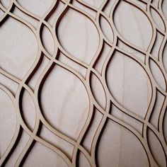 a close up view of an intricate wooden pattern