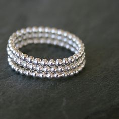 Trio of Stacking Silver Bead Rings Solid Sterling by KiraFerrer Dainty Sterling Silver Jewelry With Spacer Beads, Adjustable Ring With Silver Beads, Adjustable Stackable Silver Bands, Minimalist Silver Rings With Round Beads, Silver Rings With Spacer Beads As Gift, Silver Rings For Gifts, Bubble Rings, Boho Wedding Bands, Rings Beaded