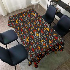 Bring the vibrancy and cultural beauty of Africa to your next dinner party with our unique African Tablecloth in Mudcloth Print. The authentic design features an exquisite traditional African pattern that is sure to give your tabletops a unique look. Perfect for formal and informal gatherings. Product Features Made of durable cotton linen cloth material. Lightweight, durable and could be folded away compactly. Perfect for Dining Room, Tea Table, Picnics, Parties, and Other Furniture. Scratch res African Table, Beauty Of Africa, Cloth Patterns, Cultural Beauty, Kente Print, African Mudcloth, Cloth Design, Skirt Swimsuit, Midi Flare Skirt