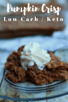 pumpkin crisp low carb / keto dessert on a glass plate with whipped cream