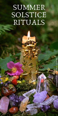 a candle surrounded by crystals and flowers with the words summer solstice rituals