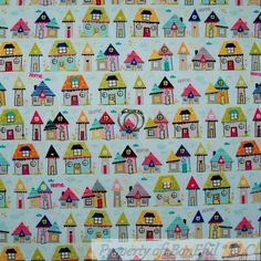 the colorful houses are all over the wallpaper in this house - themed fabric pattern