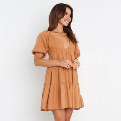 Above Knee Length V Neckline Short Sleeves With Elasticised Cuff Elasticised Shoulders Back Invisible Zip Drop Tier Design Lined New With Tags In Size L. Light Pink Lace Dress, Marilyn Dress, Tie Dye Mini Dress, Tan Dress, Free People Mini Dress, Sun Dresses, Floral Sheath Dress, Black Party Dresses, Bow Detail Dress