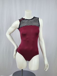 Unique side snap leotard in Wine with Black Cabaret Mesh  - Solid Wine matte milliskin base - Black Cabaret mesh (big hole mesh) - A side gunmetal snap enclosure is on the right shoulder for easy access. This listing includes USPS First Class Shipping throughout the US. Additional shipping charges apply to international orders. Summer Nylon Dancewear Bodysuit, Summer Dancewear Nylon Bodysuit, Fitted Party Bodysuit With Mesh Back, Fitted Bodysuit With Mesh Back For Party, Stretch Dancewear Bodysuit For Club, Summer Dance Bodysuit With Stretch, Summer Dance Bodysuit With High Stretch, High Stretch Nylon Bodysuit For Dancewear, High Stretch Bodysuit For Summer Dance