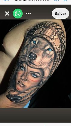 a person with a wolf tattoo on their arm