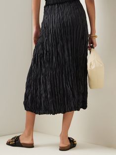 Midi length skirt in pleated wrinkle style fabric. Ruched waistband. Matching pleated wrinkle blouse. Model is in MINUSEY ONE SIZE. ✔️ Free worldwide express shipping over $100✔️ Loved by 6,500+ customers✔️ Limited edition collections, maximum style⠀⠀⠀⠀⠀⠀⠀⠀⠀Stay ahead of the trend with can’t-find-anywhere-else staples. Your closet will thank you 💕 * MINUSEY ONE SIZE = EU 34 -38, US 2-6* 100% Polyester* Dry clean* Made in Korea - Model Height: 172cm/5'7" (US2, EU34) Long Pleated Silk Skirt, Pleated Silk Midi Skirt, Chic Relaxed Pleated Skirt, Silk Pleated Midi Skirt, Chic Silk Skirt With Accordion Pleats, Evening Pleated Skirt With Relaxed Fit, Silk Pleated Skirt With Accordion Pleats For Spring, Silk Accordion Pleated Skirt For Spring, Silk Accordion Pleated Flowy Skirt