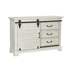 a white dresser with black handles and drawers