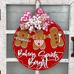 This festive Baking Spirits Bright Door Hanger will make your home the envy of the neighborhood! With cute gingerbread men and cookie-making supplies, it's the perfect way to get your holiday cheers started! Yule love it! Hand painted by you; our kits come with all the pieces you need. Our kits come unfinished so you can paint them in colors you like to create consistent decor throughout your home. The finished product measures approximately 10.5" round. Add a sprinkle of joy to your home décor Gingerbread Man Door Hanger, Gingerbread Door Hanger, Gingerbread Door, Bright Door, Grinch Ideas, Festive Baking, Baking Spirits Bright, Cookie Making, Door Hangers Diy