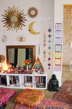 a living room filled with lots of furniture and decor