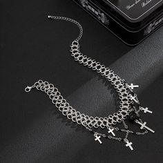 Description:Punk Layered Cross Tassel Collar Choker NecklaceSpecification:Size: 11.8" + 2.7" extWeight: 1.07 oz/pcsMaterial: alloy metal. glass seed beadChain colors: silverFeatures & Details:This punk style cross tassel collar choker necklace is made of nickel-free. lead-free. cadmium-free and hypoallergenic materials. which will not turn your skin green or cause anaphylactic reaction.It is easy to match your different outfits and also suitable for any occasions like wedding. banquet. costume p Punk Alloy Jewelry For Halloween, Halloween Metal Necklace With Adjustable Chain, Punk Metal Choker For Halloween, Metal Chain Choker For Festivals, Nickel-free Metal Necklace For Halloween, Punk Style Alloy Chain Necklace, Punk Alloy Choker Necklace, Punk Alloy Chain Necklace, Punk Style Stainless Steel Jewelry For Party