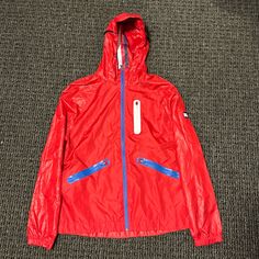 Never Worn Tommy Hilfiger Wind Breaker Size Large Casual Red Outerwear For Outdoor, Casual Red Windbreaker For Winter, Casual Red Winter Windbreaker, Tommy Hilfiger Casual Spring Outerwear, Casual Tommy Hilfiger Outerwear For Spring, Red Hooded Casual Windbreaker, Red Hooded Outerwear For Spring, Casual Red Outerwear, Red Tommy Hilfiger Long Sleeve Outerwear