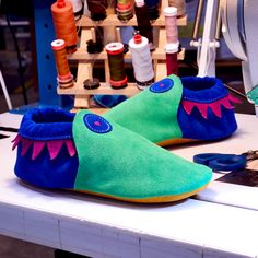 Custom Shoe of the Week: Roo Moccasins in Emerald and Royal with Fuchsia Elf Trim. Handcrafted in Oregon. Green Moccasins With Leather Sole, Green Slip-on Moccasins With Rubber Sole, Green Closed Toe Moccasins With Leather Sole, Green Leather Sole Closed Toe Moccasins, Leather Non-slip Slip-on Moccasins, Leather Slip-on Non-slip Moccasins, Suede Moccasins With Soft Sole And Closed Toe, Suede Moccasins With Soft Closed Toe, Closed Toe Suede Moccasins With Soft Sole