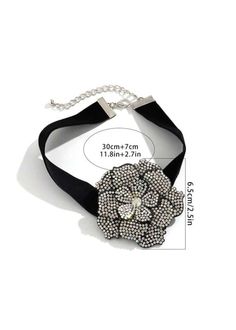 This Rhinestone Flower Decor Choker adds a touch of elegance to any outfit. The intricate flower design, adorned with sparkling rhinestones, creates a mesmerizing effect. Elevate your style with this stunning accessory that is sure to make a statement. * Return and exchange are not supported Elegant Embellished Flower Jewelry, Elegant Flower Embellished Jewelry, Floral Jewelry For Parties, Adjustable Flower Decoration Jewelry For Party, Black Rhinestone Necklace For Wedding, Adjustable Elegant Jeweled Rhinestone Necklace, Elegant Adjustable Jeweled Rhinestone Necklace, Crystal Flower-shaped Necklaces For Parties, Flower Shaped Rhinestone Jewelry For Parties